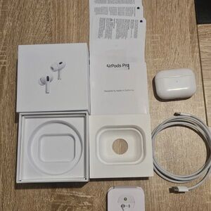Apple AirPods Pro with White Charging Case and Accessories